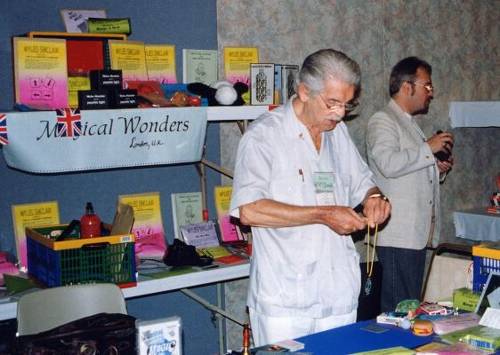 Billy McComb and Myles work the Magical Wonders trade stand. 